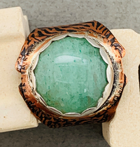 Safari themed ring with adventurine stone set in scalloped silver bezel