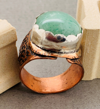 Safari themed ring with adventurine stone set in scalloped silver bezel