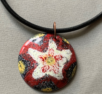 Red and White Flowered Star Disc Pendant