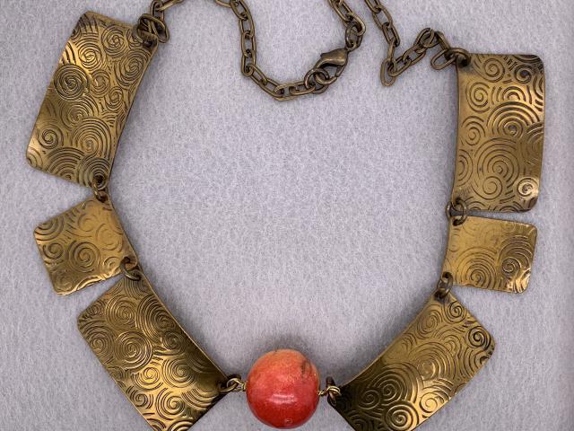 Spiral Printed Brass Necklace with Coral Orange Bead