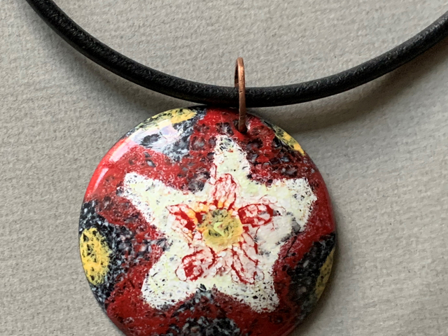 Red and White Flowered Star Disc Pendant